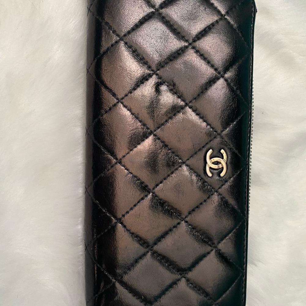 Chanel WOC this was dyed black and sealed. Blue interior. No chain included.